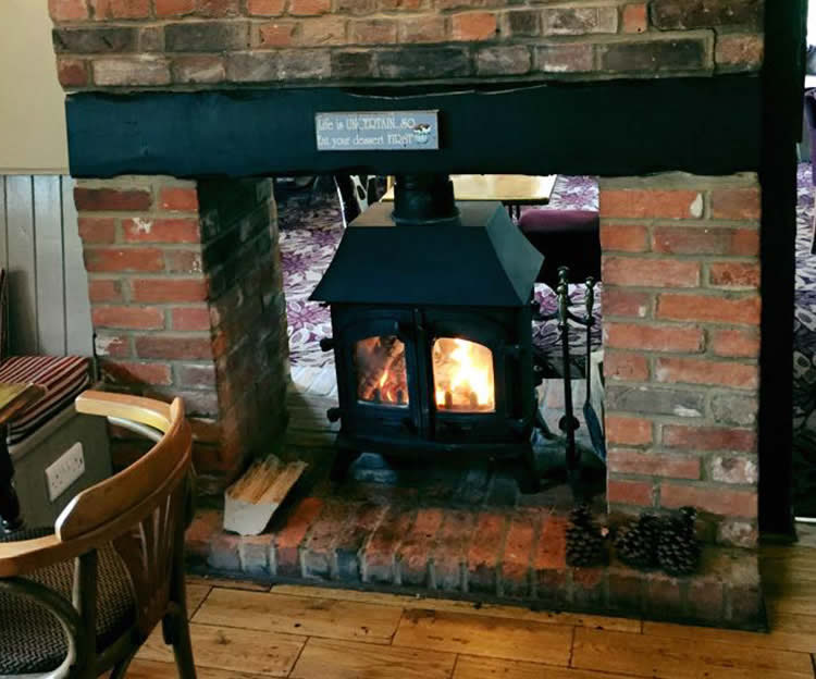 Cosy log burner inside the pub