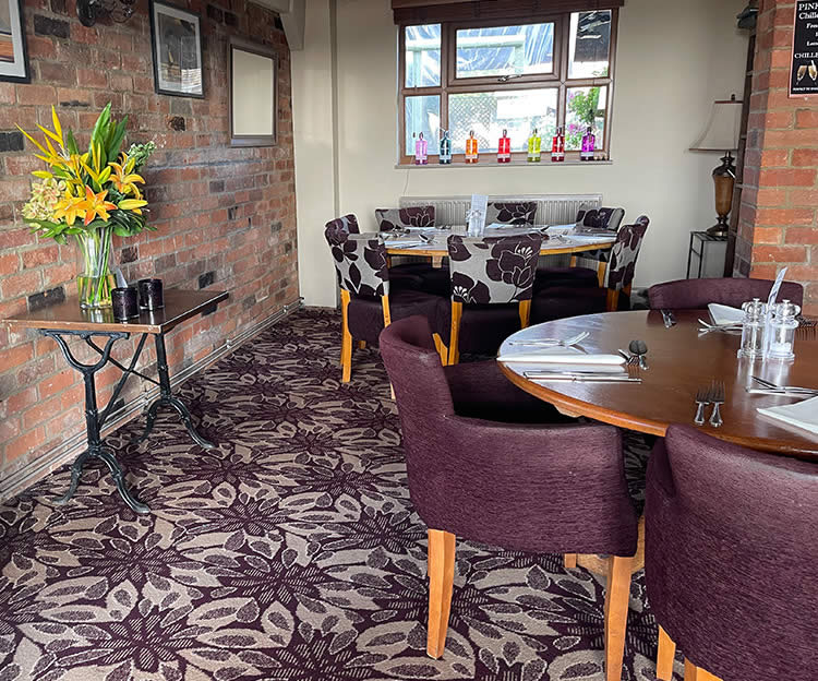 Lovely dining tables available inside the pub